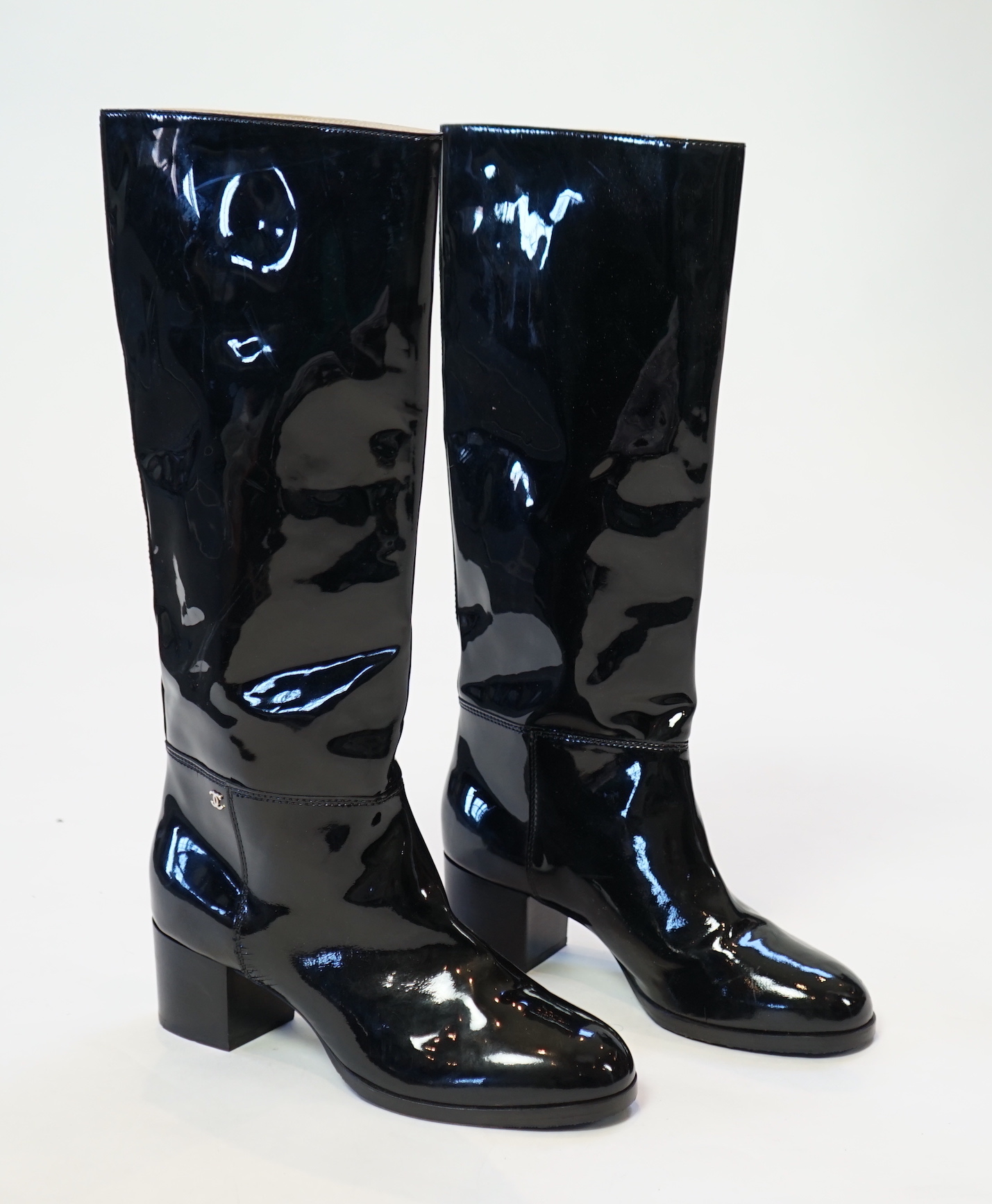 A pair of Chanel lady's black patent knee high mid heel rain boots, size EU 40.5